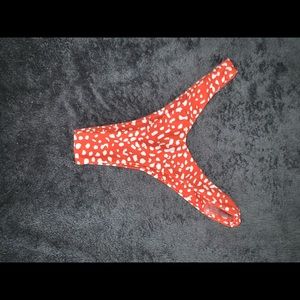 Orange and white bikini bottom